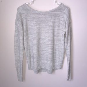 Light gray sweater.
